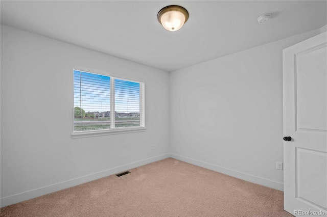827 Forest Canyon Rd, Severance, CO 80550 - unfurnished room featuring light colored carpet, a smoke detector, and baseboards