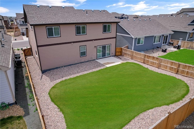 827 Forest Canyon Rd, Severance, CO 80550 - rear view of house featuring a patio, a shingled roof, and a residential view