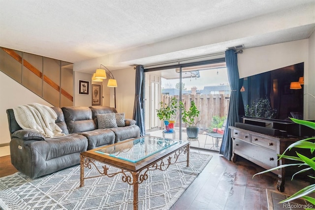 7995 E Mississippi Ave Unit C11, Denver, CO 80247 - living room with wood finished floors and a textured ceiling