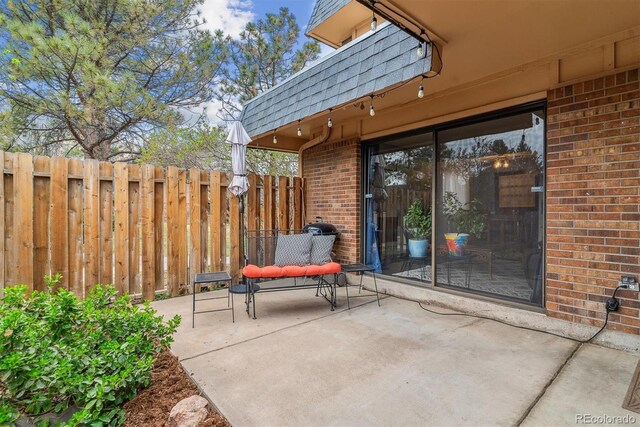 7995 E Mississippi Ave Unit C11, Denver, CO 80247 - view of patio / terrace with fence