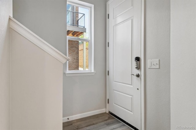 457 Interlocken Blvd Unit 101, Broomfield, CO 80021 - entryway featuring wood finished floors and baseboards