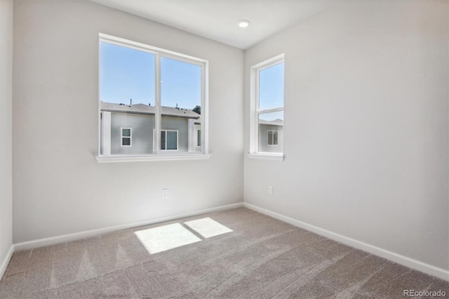 457 Interlocken Blvd Unit 101, Broomfield, CO 80021 - carpeted empty room featuring baseboards