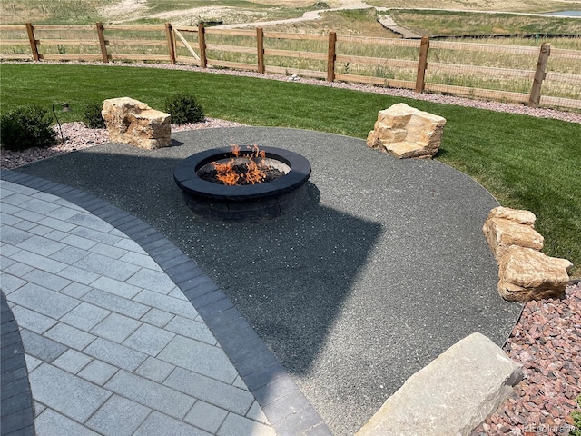 exterior space with an outdoor fire pit