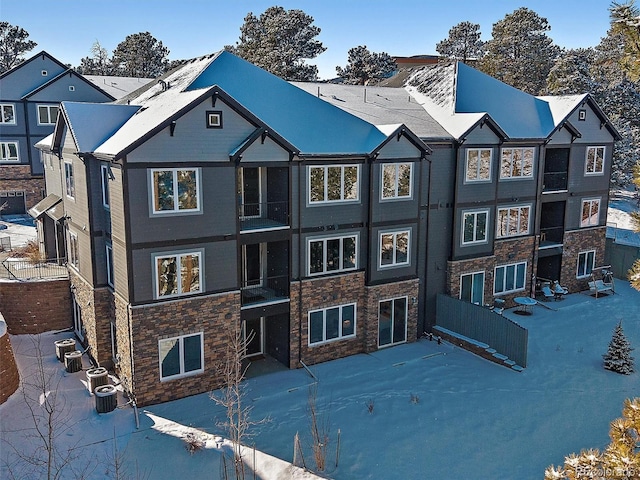 view of property featuring central AC unit