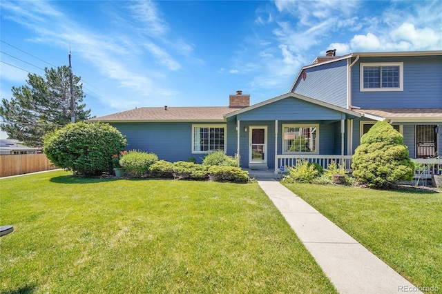 10116 Quivas St, Thornton, CO 80260 - view of front of home with a chimney and covered porch