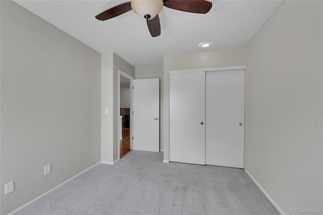 10116 Quivas St, Thornton, CO 80260 - unfurnished bedroom featuring carpet floors, a closet, a textured ceiling, and a ceiling fan