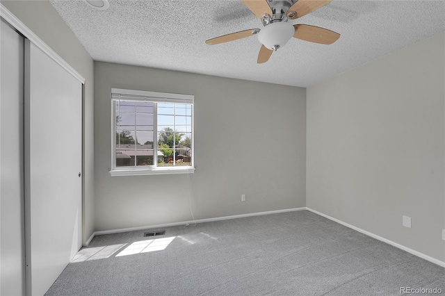 10116 Quivas St, Thornton, CO 80260 - unfurnished bedroom featuring carpet, a textured ceiling, a closet, and a ceiling fan