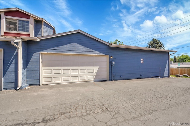 10116 Quivas St, Thornton, CO 80260 - garage featuring driveway