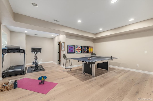 playroom with light hardwood / wood-style floors