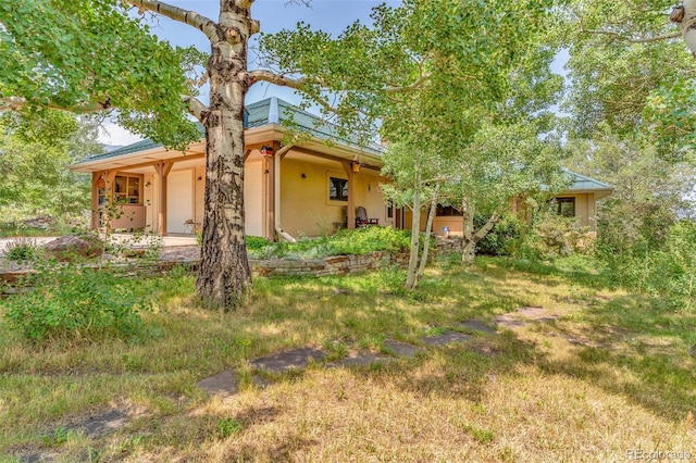 exterior space with a front yard