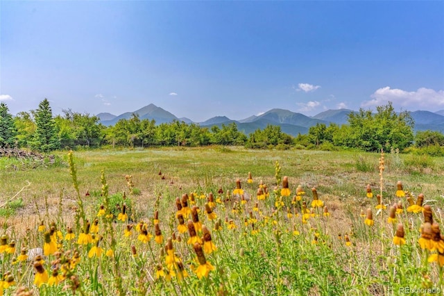 view of mountain feature with a rural view