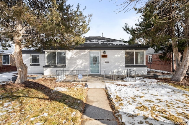 view of front of property with brick siding