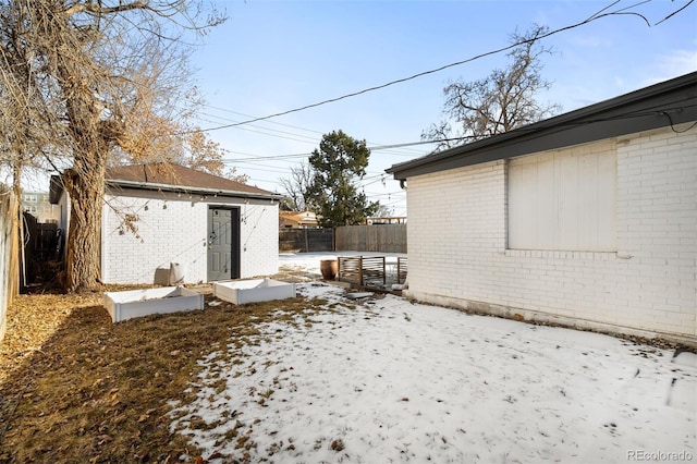 view of yard covered in snow