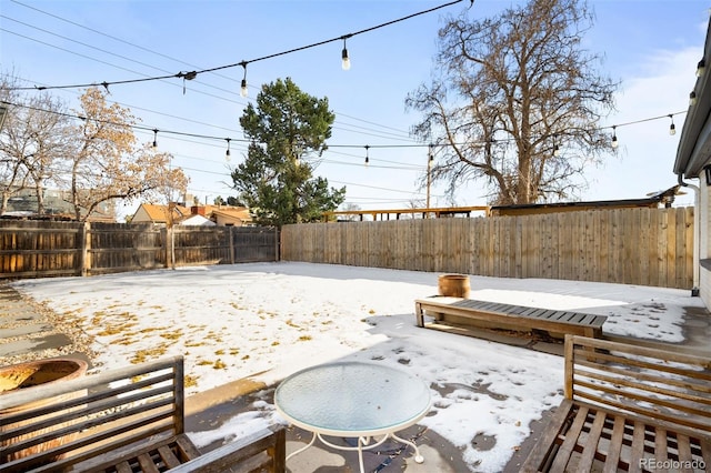 view of snow covered patio