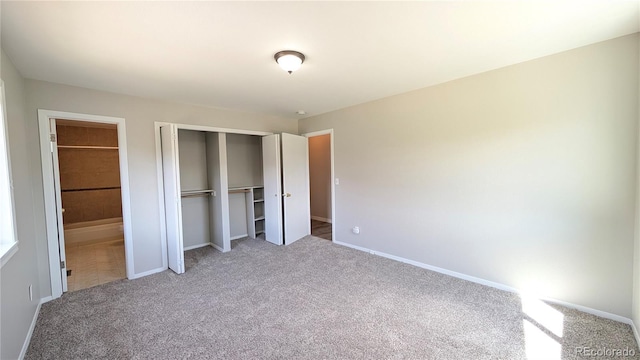 720 Northwoods Dr W, Woodland Park, CO 80863 - unfurnished bedroom featuring baseboards, carpet, and a closet