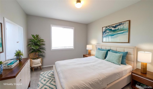 720 Northwoods Dr W, Woodland Park, CO 80863 - bedroom featuring baseboards and carpet
