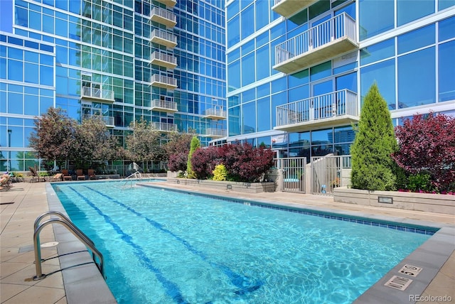 community pool with fence