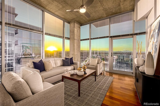 1700 Bassett St Unit 2117, Denver, CO 80202 - sunroom / solarium featuring expansive windows, wood finished floors, and a towering ceiling