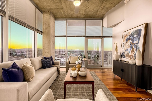 1700 Bassett St Unit 2117, Denver, CO 80202 - living room with floor to ceiling windows, wood finished floors, and a ceiling fan