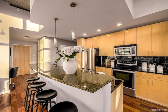 1700 Bassett St Unit 2117, Denver, CO 80202 - kitchen featuring appliances with stainless steel finishes, light brown cabinets, dark wood-type flooring, backsplash, and recessed lighting