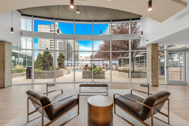 1700 Bassett St Unit 2117, Denver, CO 80202 - lobby with a wall of windows, a towering ceiling, and a view of city