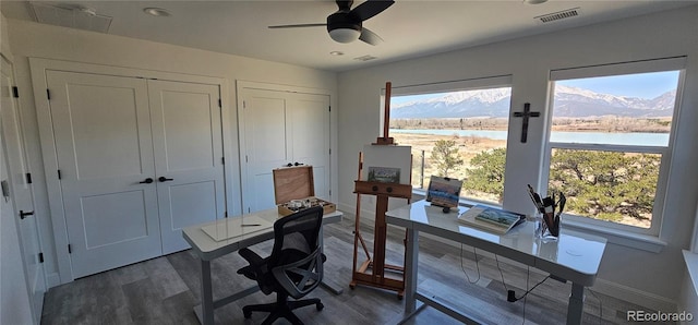 29918 Teal Run, Buena Vista, CO 81211 - office area featuring dark wood-style floors, ceiling fan, baseboards, a water view, and recessed lighting