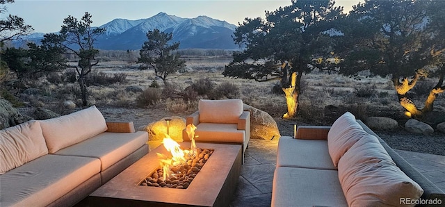29918 Teal Run, Buena Vista, CO 81211 - view of patio featuring an outdoor living space with a fire pit and a mountain view