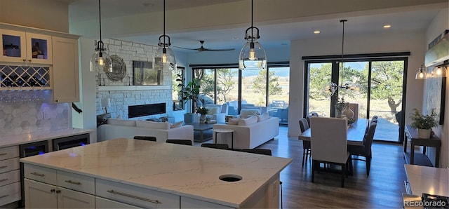 29918 Teal Run, Buena Vista, CO 81211 - kitchen featuring open floor plan, plenty of natural light, tasteful backsplash, and recessed lighting
