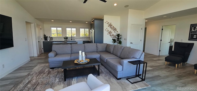 29918 Teal Run, Buena Vista, CO 81211 - living room featuring light wood-style floors, baseboards, recessed lighting, ceiling fan, and vaulted ceiling