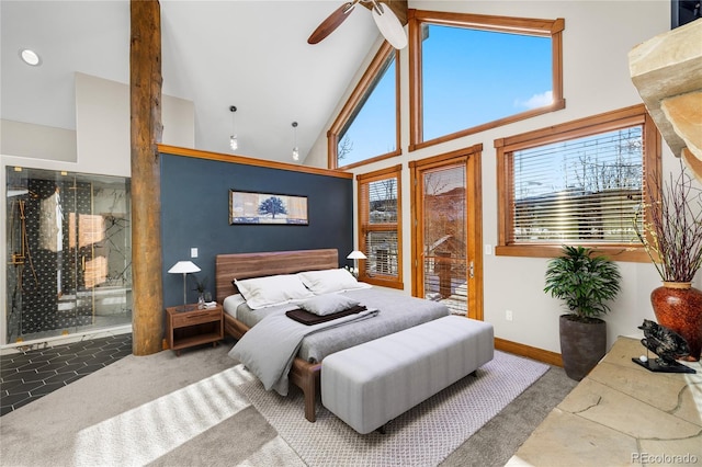 carpeted bedroom featuring baseboards, high vaulted ceiling, beam ceiling, and ensuite bathroom