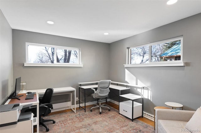 office space with light wood-type flooring