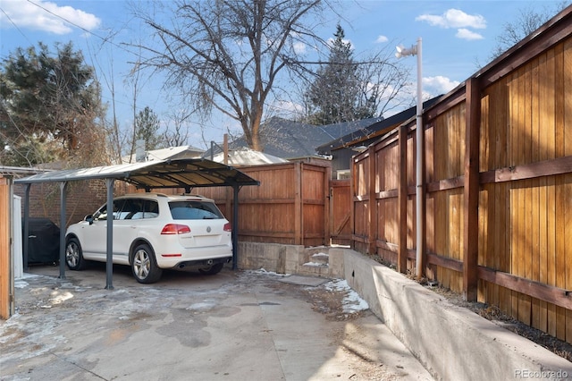 exterior space with a carport