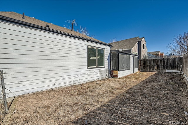 view of home's exterior with a fenced backyard