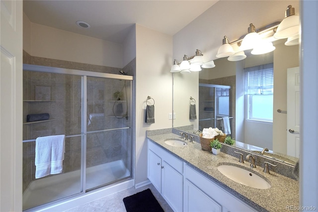 13424 W 64th Pl, Arvada, CO 80004 - full bathroom featuring a shower stall and double vanity