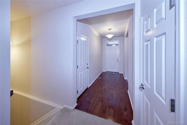 13424 W 64th Pl, Arvada, CO 80004 - hallway featuring baseboards and dark wood-style floors