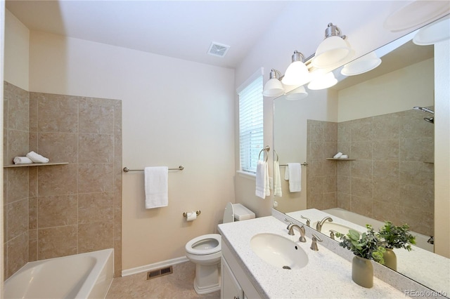 13424 W 64th Pl, Arvada, CO 80004 - full bath featuring vanity, toilet,  shower combination, tile patterned flooring, and baseboards