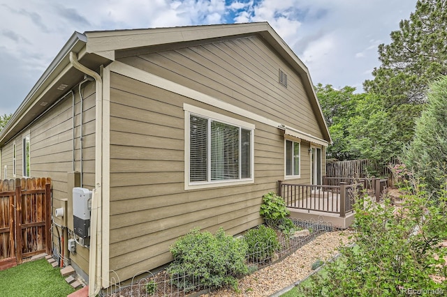 13424 W 64th Pl, Arvada, CO 80004 - view of home's exterior featuring a wooden deck