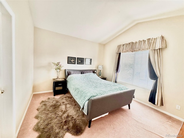 2575 S Syracuse Way Unit F301, Denver, CO 80231 - carpeted bedroom featuring lofted ceiling and baseboards