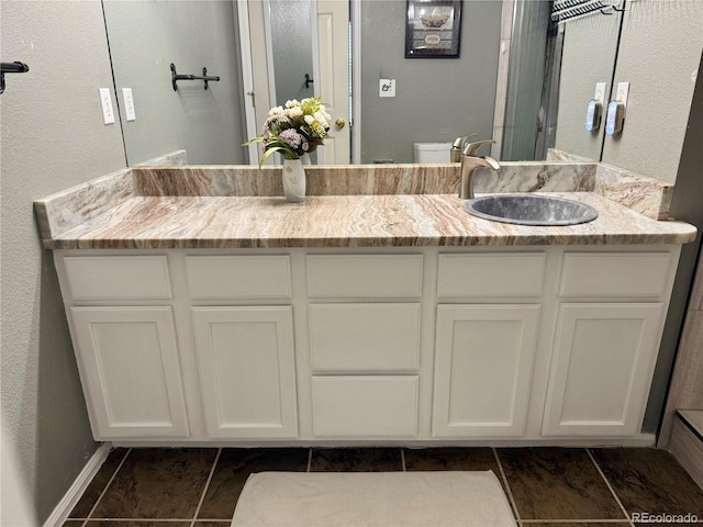 2575 S Syracuse Way Unit F301, Denver, CO 80231 - full bath with vanity and tile patterned flooring