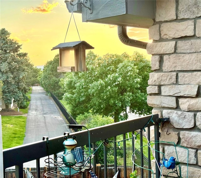 2575 S Syracuse Way Unit F301, Denver, CO 80231 - view of balcony at dusk