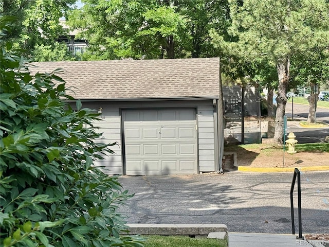 2575 S Syracuse Way Unit F301, Denver, CO 80231 - garage featuring driveway