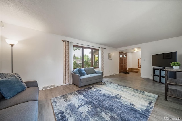 2276 S Dover Way, Lakewood, CO 80227 - living room with wood finished floors and baseboards