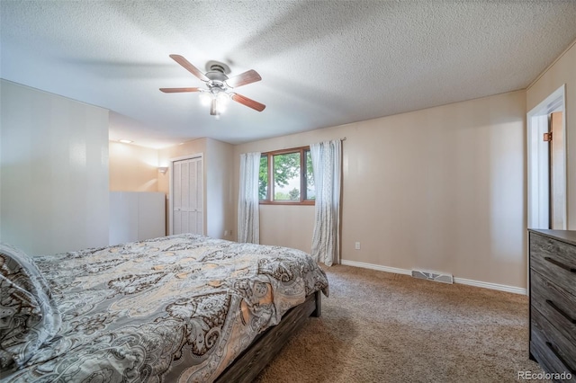 2276 S Dover Way, Lakewood, CO 80227 - bedroom featuring carpet, a ceiling fan, a textured ceiling, and baseboards