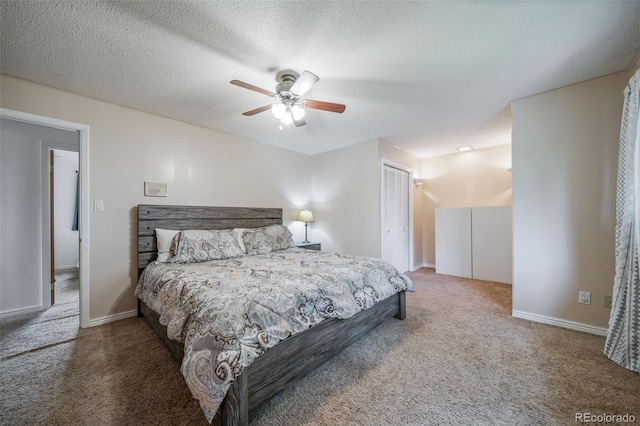 2276 S Dover Way, Lakewood, CO 80227 - carpeted bedroom featuring a closet, ceiling fan, and a textured ceiling