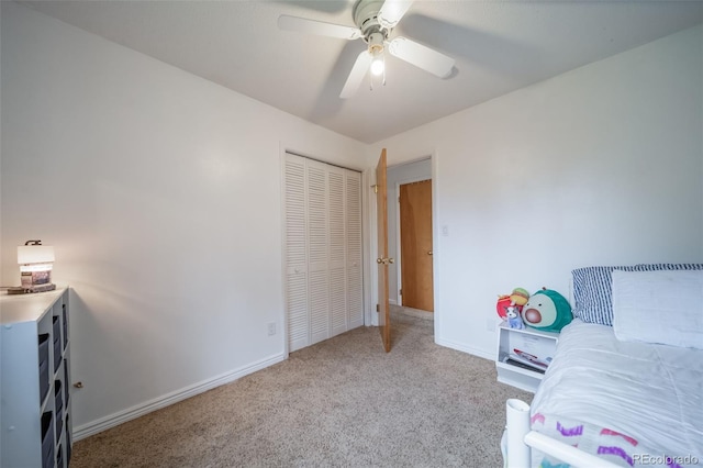 2276 S Dover Way, Lakewood, CO 80227 - carpeted bedroom featuring a closet, baseboards, and ceiling fan