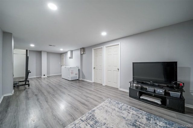 2276 S Dover Way, Lakewood, CO 80227 - living room with wood finished floors, recessed lighting, and baseboards