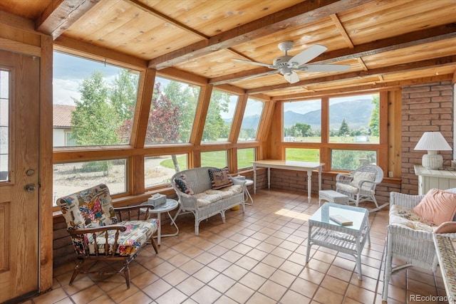 534 Crestone Ave, Salida, CO 81201 - sunroom / solarium with tile patterned floors, a mountain view, a wooden ceiling with exposed beams, healthy amount of natural light, and ceiling fan