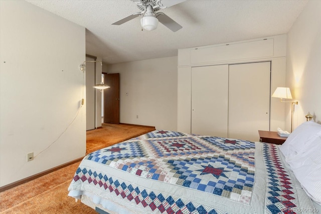 534 Crestone Ave, Salida, CO 81201 - bedroom with light colored carpet, a closet, and a ceiling fan