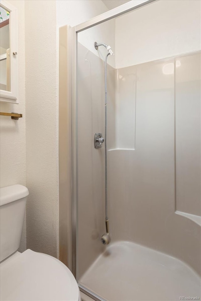 534 Crestone Ave, Salida, CO 81201 - bathroom with toilet and a shower