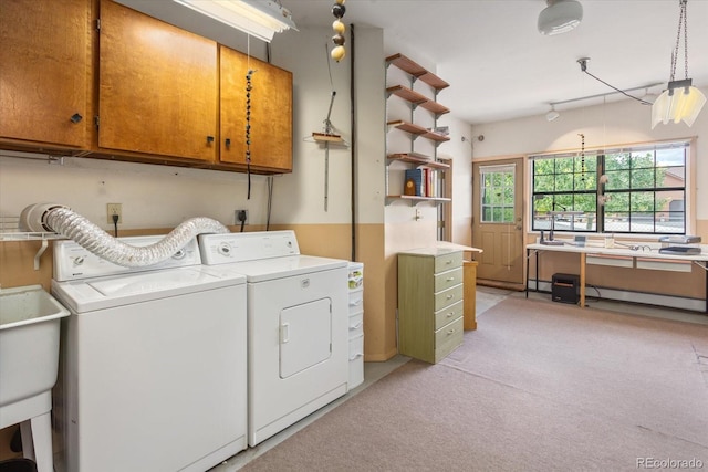 534 Crestone Ave, Salida, CO 81201 - laundry room with cabinet space, washer and clothes dryer, light colored carpet, and baseboard heating